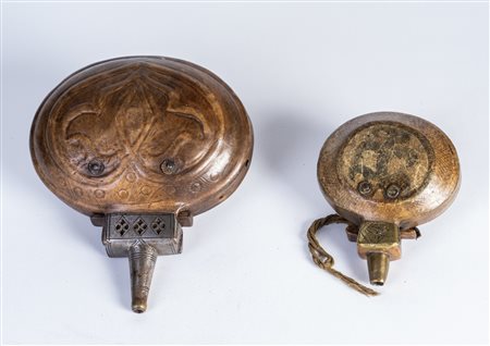 Arte Islamica  Two Ottoman leather coated metal powder flasksTurkey, 18th -19th century .
