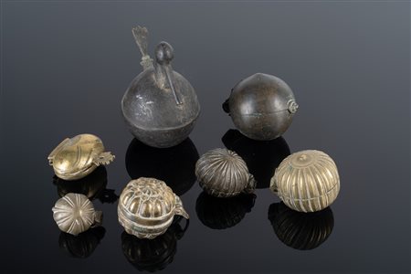 Arte Indiana  A collection of six metal Mughal powder flasks India, 19th century .