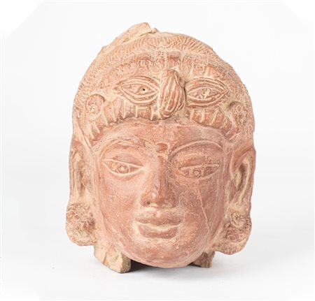Arte Indiana  A Gupta female earthenware head Northern India, 3rd-6th century .