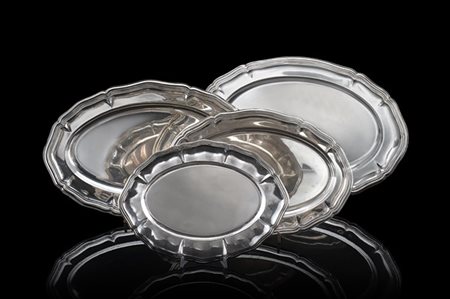 Gruppo di quattro pescere diverse in argento, cifrate "RM". Titolo 800 (cm max