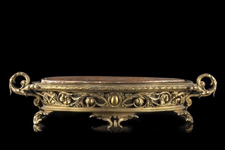 Fioriera centrotavola in bronzo con anse cesellate a volute fogliate, fascia tr