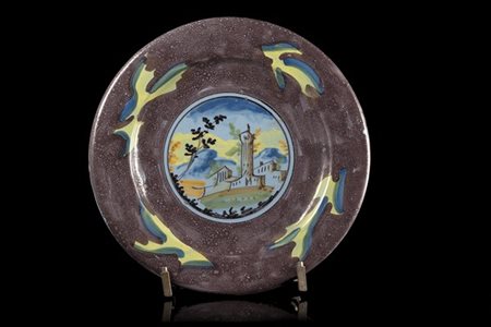 Manifattura di Pavia, secolo XVIII. Tondo in maiolica decorata nel cavetto a pa