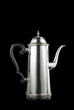 Caffettiera in argento liscio, ansa a voluta in legno ebanizzato e presa tornit