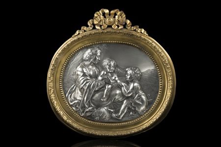 Placca ovale in argento sbalzato e inciso con Madonna con Bambino e San Giovann