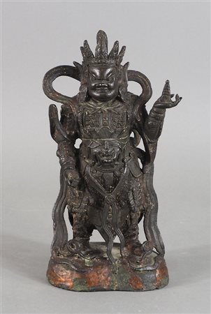 Scultura in bronzo raffigurante Divinità". Tarda dinastia Ming. H. cm. 30.