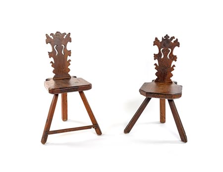 
Two ancient stools with shaped walnut back