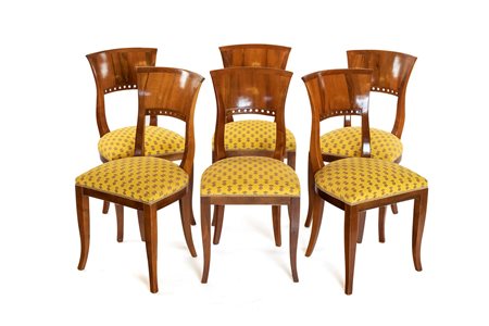 
Twelve fruit wood chairs