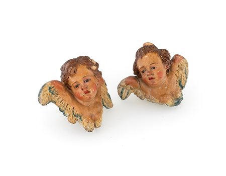 
Polycrome terracotta pair of cherubs
