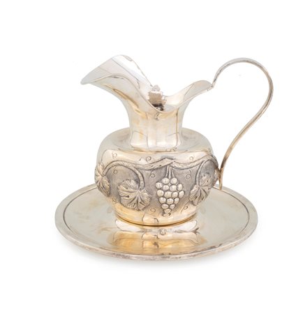 
 

Silver spout with lit