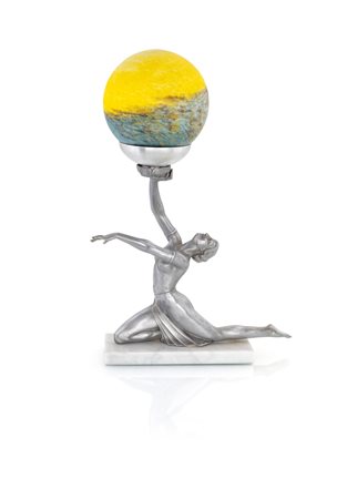 
 

Silver metal sculpture of a dancer from the beginning of 20th century