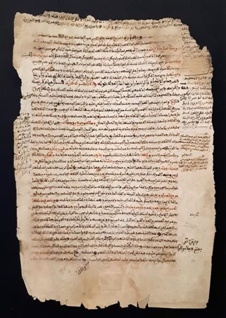 ANTICA PAGINA MANOSCRITTA in inchiostro di galla bruno e lacca rossa, cm...