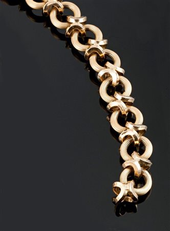 BRACCIALE Bracciale in oro giallo composto da maglie ad anello lavorate Peso...