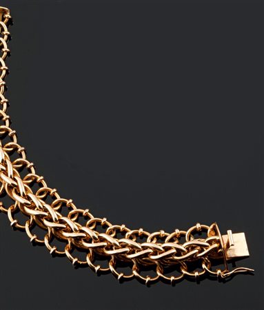 BRACCIALE Bracciale in oro giallo lavorato a maglie Peso gr 73,8 Lungh. cm 20