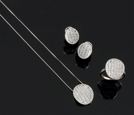 DEMI-PARURE Demi-parure in oro bianco composta da coppia di orecchini, anello...