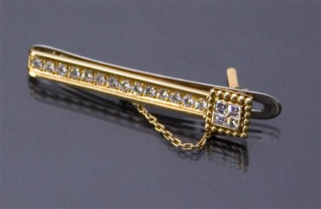 FERMACRAVATTA Fermacravatta in oro giallo con diamanti taglio brillante e...
