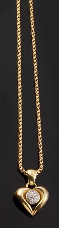 COLLANA Collana in oro giallo con pendente a forma di cuore trattenente nella...