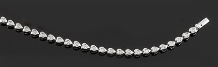 BRACCIALE Bracciale in oro bianco, modello tennis, composto da piccoli cuori...