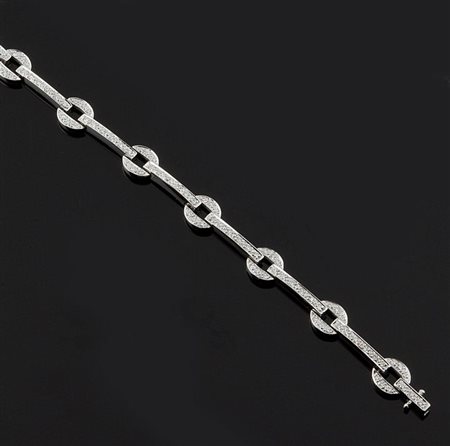 BRACCIALE Bracciale in oro bianco composto da segmenti rigidi alternati ad...