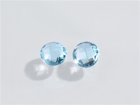COPPIA DI TOPAZI AZZURRI CT 11.15 E CT 11.92 di forma rotonda, taglio misto,...