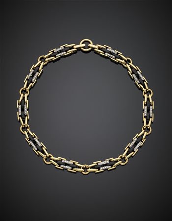 POMELLATO
Collier in oro giallo e bianco con maglia concatenata rifinito in bac