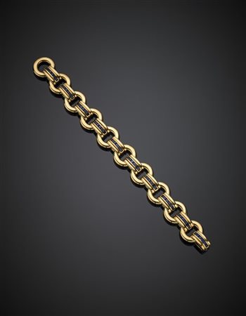 FARAONE
Bracciale a catena in oro giallo rifinito con zaffiri calibré, g 60,54,