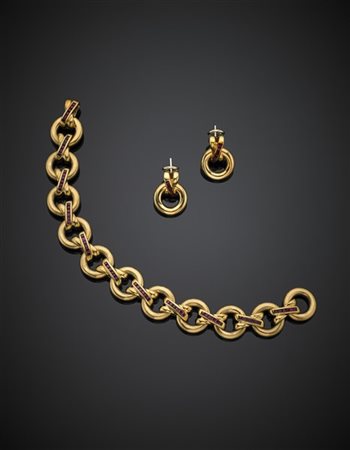 FARAONE
Demi-parure composta da bracciale a catena e orecchini in oro giallo ri