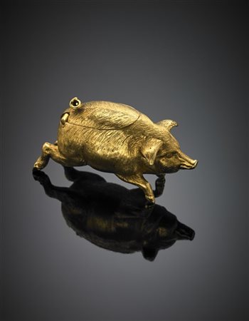 Portacenere in oro giallo cesellato a guisa di maialino, g 132,26, lungh. cm 8,