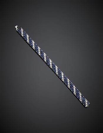 Bracciale flessibile in oro bianco con diamanti per complessivi ct. 3,40 circa