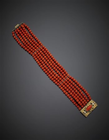 Bracciale a sei fili con boules di corallo rosso di mm 5 circa rifinito con dis