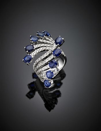 CURRADO
Anello a contrariè in oro bianco con diamanti per complessivi ct. 2 cir