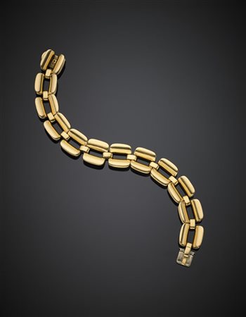 CUSI
Bracciale modulare in oro giallo, g 98,11, lungh. cm 20,10 circa. Firmato