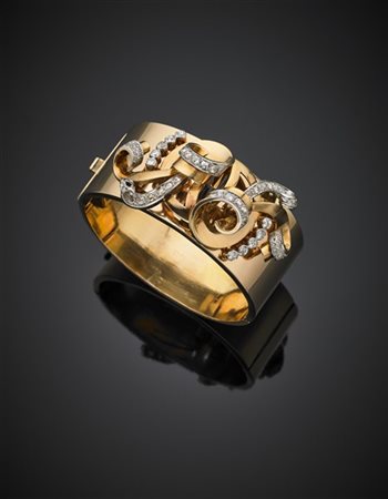 Bracciale in oro giallo con centrale a due clip indossabili separatamente, rifi