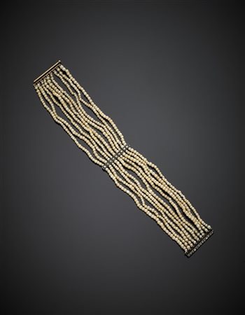 Bracciale multifili in microperle con distanziatori e chiusura in oro giallo, a