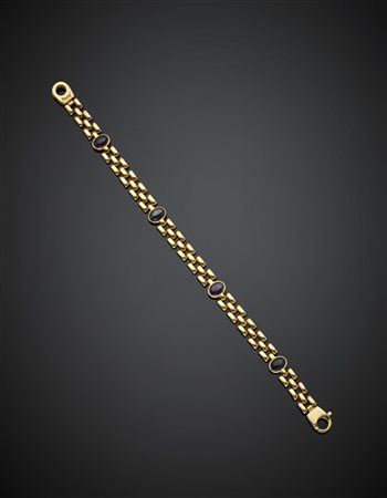 MERU'
Bracciale in oro giallo con rubini e zaffiri cabochon, g 18,15, lungh. cm