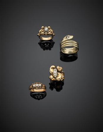 Lotto di quattro anelli in oro giallo e rosso, uno in oro 333/1000 con diamanti