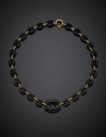 Collier a scalare a catena marinara in oro giallo e bachelite, g 27,34, lungh.