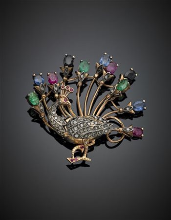 RIVERSO
Spilla a guisa di pavone in oro giallo 500/1000, argento e diamanti a m