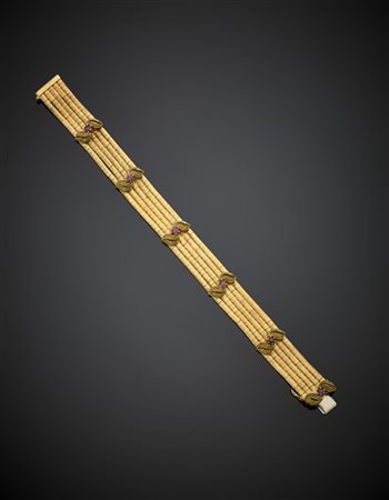 UNOAERRE
Bracciale modulare a cinque fili in oro giallo satinato e rubini rosa,