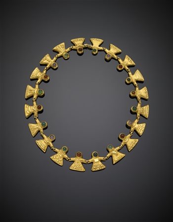 Collier modulare in oro giallo satinato e bambole stilizzate,
ciascuna con deco