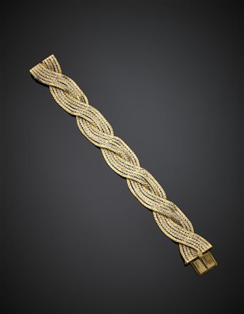 Bracciale intrecciato in oro giallo e bianco, g 74,85, lungh. cm 19 circa. Marc
