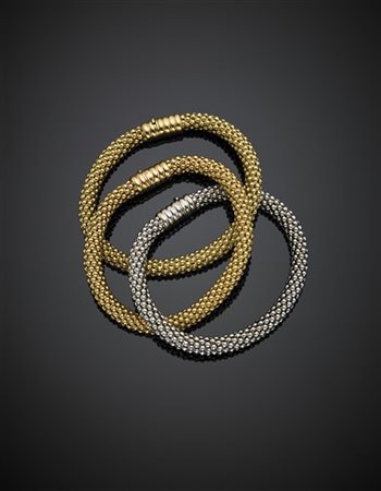MASELLA
Lotto di tre bracciali, uno in oro bianco, uno in oro giallo e uno in o