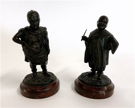 Coppia di calamai in bronzo a figure maschili in bronzo con teste sollevabili s