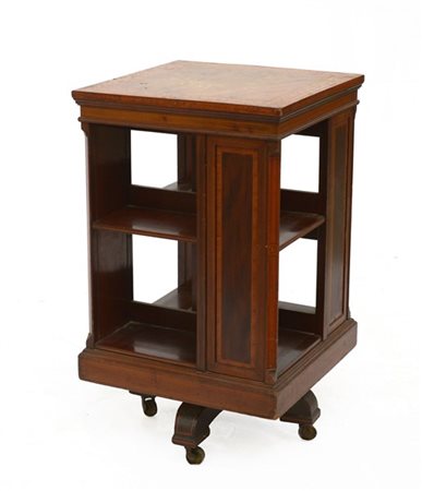 Libreria girevole intarsiata e filettata in legni vari a volute e fiori. Gambe