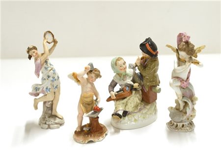 Manifatture diverse, lotto di quattro sculturine in porcellana decorata in poli