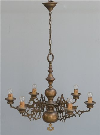 Lampadario "olandese" a sei luci in bronzo con bracci traforati e fusto tornito