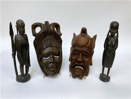 Manifattura africana, lotto composto da due maschere e due sculture ornamentali