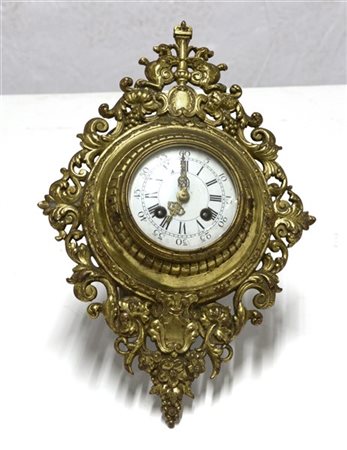 Orologio Cartel con cassa in metallo dorato e cesellato, quadrante smaltato a n