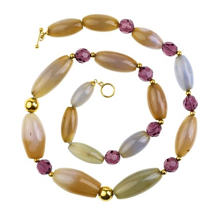 COLLANA IN CALCEDONIO, AMETISTE E ORO GIALLO, 1990 CIRCA realizzata ad una...