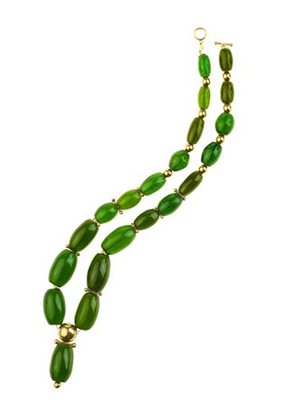 LUNGA COLLANA IN RESINA ARTIFICIALE E ORO GIALLO, 1990 CIRCA realizzata ad...