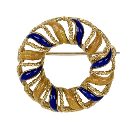 SPILLA IN ORO GIALLO E SMALTI realizzata a forma circolare, decorata da...